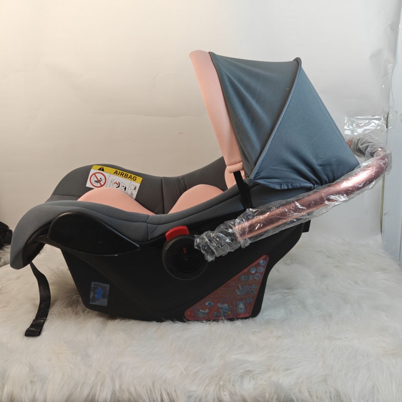 مقعد سيارة للبيبي باللون الوردي – Siège auto bébé pink