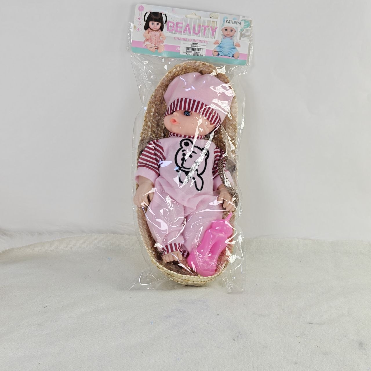 دمية أطفال مع سلة – Baby Doll with Basket لعبة رائعة تضيف لمسة من المرح والحنان لعالم الأطفال