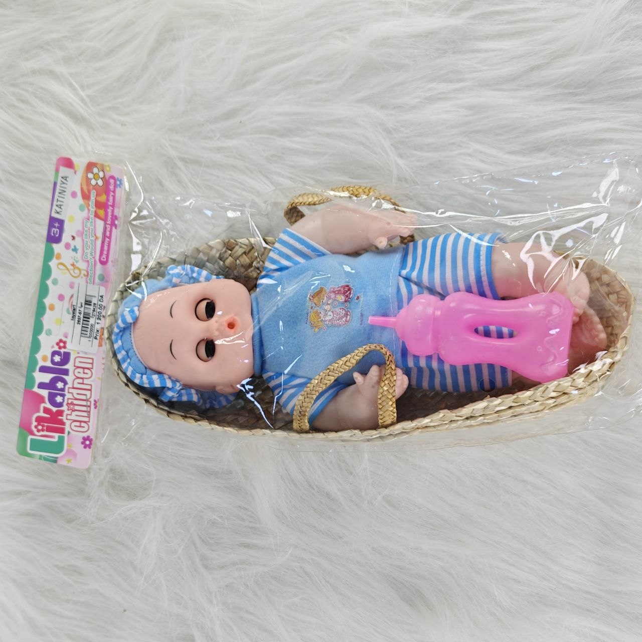 دمية أطفال مع سلة – Baby Doll with Basket لعبة رائعة تضيف لمسة من المرح والحنان لعالم الأطفال