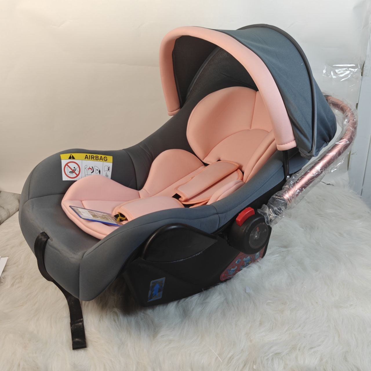 مقعد سيارة للبيبي باللون الوردي – Siège auto bébé pink